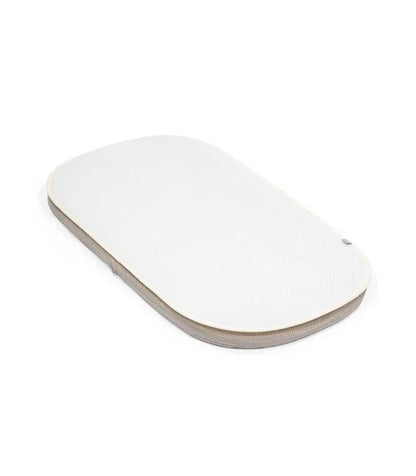 Stokke® Snoozi™ Sábana Protectora